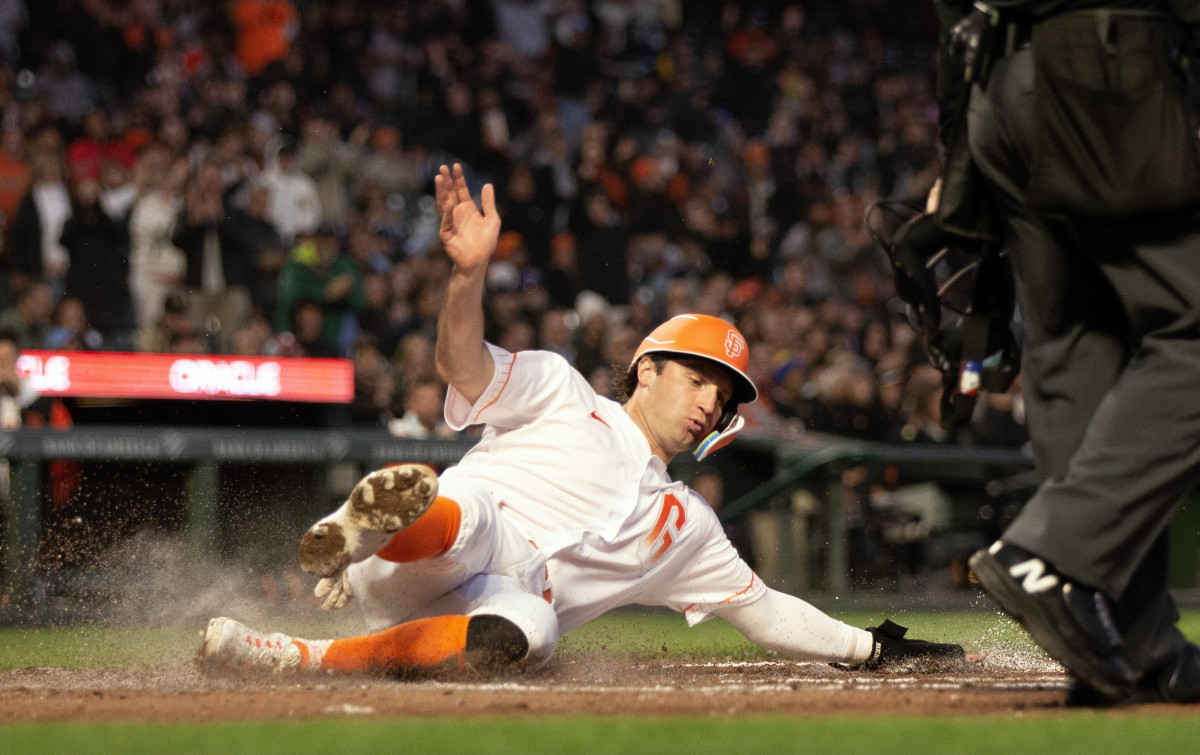 SF Giants shortstop Casey Schmitt slides safely home against the Philadelphia Phillies on May 16, 2023.